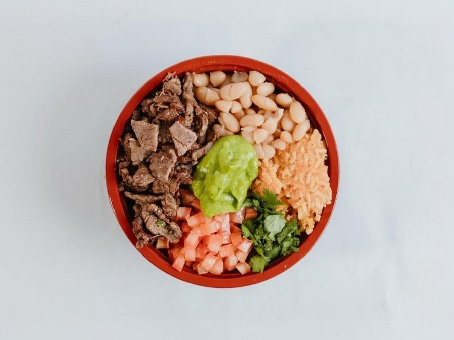 Printed menu page with taco section
